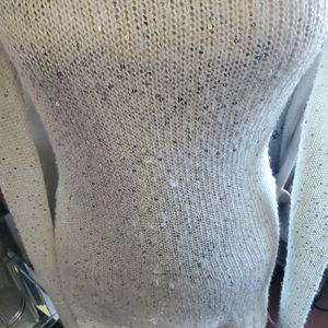 White shimmery sweater